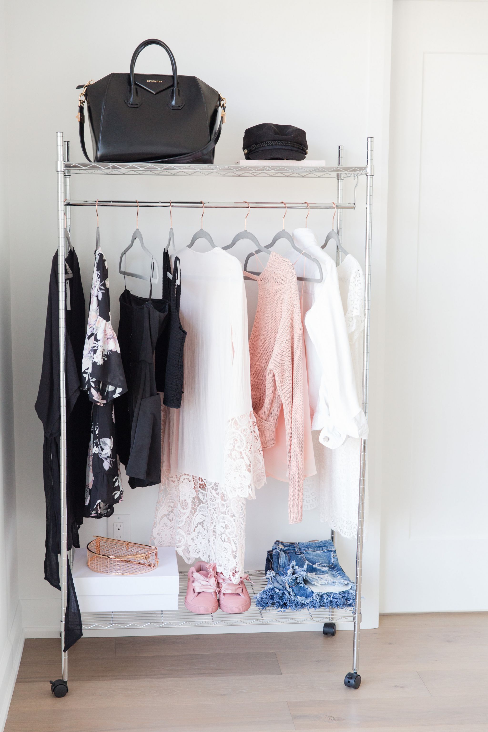 1 rolling rack, styled with clothing